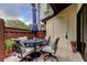 Charming patio featuring comfortable seating, blue umbrella, and decorative accents at 2913 Fig Ct, Palm Harbor, FL 34684