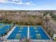 Aerial view of community basketball courts alongside tennis courts at 29713 Bright Ray Pl, Wesley Chapel, FL 33543