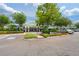Exterior of the community clubhouse with landscaping and convenient parking at 29713 Bright Ray Pl, Wesley Chapel, FL 33543