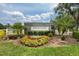 Entrance to Morningside community with landscaping and signage at 29713 Bright Ray Pl, Wesley Chapel, FL 33543