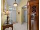 Bright foyer with tile flooring, elegant lighting, and tasteful decor that welcomes you into the home at 29713 Bright Ray Pl, Wesley Chapel, FL 33543