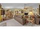 Bright and open living area with views of the dining area and kitchen, and comfortable seating at 29713 Bright Ray Pl, Wesley Chapel, FL 33543