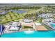 Aerial view of amazing lagoon-style pool and community amenities, including restaurants, bar and lounge areas at 32231 Conchshell Sail St, Wesley Chapel, FL 33545