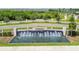 Epperson community entrance featuring a water fountain and manicured landscaping at 32231 Conchshell Sail St, Wesley Chapel, FL 33545