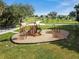 Community playground with slides and climbing structures for outdoor recreation at 32231 Conchshell Sail St, Wesley Chapel, FL 33545