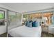Bright sunroom bedroom featuring views of a pergola and outdoor space at 341 Wertz Dr, Largo, FL 33771