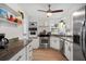 Charming kitchen with stainless steel appliances, granite countertops, and ample cabinet space at 341 Wertz Dr, Largo, FL 33771