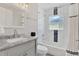 This bathroom features a shower-tub combo, marble countertop, and modern fixtures at 3613 21St S Ave, St Petersburg, FL 33711