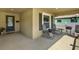 Cozy front porch with comfortable seating, ideal for relaxing and enjoying the outdoors at 3613 21St S Ave, St Petersburg, FL 33711