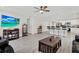 Open-concept living room with modern furnishings, hardwood flooring, and a clear view of the kitchen at 3613 21St S Ave, St Petersburg, FL 33711