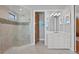 Bathroom featuring walk-in glass shower and vanity with mirror at 443 18Th Ave, Indian Rocks Beach, FL 33785