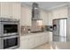 Kitchen features stainless steel appliances, gas range and neutral countertops at 443 18Th Ave, Indian Rocks Beach, FL 33785