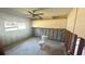 Partially renovated bathroom with installed toilet and ceiling fan at 4560 Overlook Ne Dr # 168, St Petersburg, FL 33703