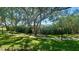 Lush community grounds with mature trees and manicured lawns at 4560 Overlook Ne Dr # 168, St Petersburg, FL 33703