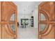 A view of the modern dining room as seen from the front door at 48 Bishop Creek Dr, Safety Harbor, FL 34695