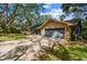 Charming single-Gathering home with a well-maintained lawn and a two-car garage at 48 Bishop Creek Dr, Safety Harbor, FL 34695