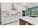 Well-equipped kitchen features stainless steel appliances, ample countertop space, and modern finishes at 48 Bishop Creek Dr, Safety Harbor, FL 34695