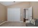 Bedroom with large closet and neutral walls, offering a simple yet functional space at 502 Creekside Ct, Safety Harbor, FL 34695