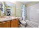 Bright bathroom features a bathtub, a vanity with storage and a mirror for a fresh look at 5109 Hartwell Loop, Land O Lakes, FL 34638