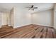 Large bedroom featuring hardwood floors, large windows and ceiling fan at 5117 Longspur Ct, Lithia, FL 33547