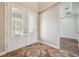 Bright foyer featuring decorative tile flooring and glass paneled double doors at 5117 Longspur Ct, Lithia, FL 33547