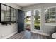 Entryway features wood floors and a view to the house across the street at 5527 Kelly N Dr, St Petersburg, FL 33703