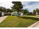 Beautiful exterior view of a house featuring a lovely yard and lush greenery at 5527 Kelly N Dr, St Petersburg, FL 33703