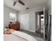 Serene bedroom showcasing closet space and an ensuite bathroom at 5527 Kelly N Dr, St Petersburg, FL 33703