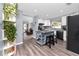 Open concept kitchen features a center island with seating and modern appliances at 5717 60Th N Way, St Petersburg, FL 33709