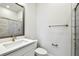 Modern bathroom featuring sleek fixtures, a white vanity, and tiled shower at 6605 N Nebraska Ave # 25, Tampa, FL 33604