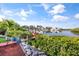 Waterfront view of a private wooden dock surrounded by lush mangroves at 6805 Arroyo Dr, New Port Richey, FL 34652