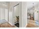 Hallway featuring hardwood floors and an elevator entrance at 6805 Arroyo Dr, New Port Richey, FL 34652
