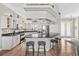 Kitchen boasts granite countertops, stainless steel appliances, and seating at the island at 6805 Arroyo Dr, New Port Richey, FL 34652