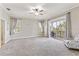 Spacious main bedroom features a balcony with outdoor seating at 6805 Arroyo Dr, New Port Richey, FL 34652