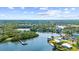 Scenic aerial of waterfront property with easy access to the inter coastal and surrounding neighborhood at 6805 Arroyo Dr, New Port Richey, FL 34652