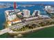 An aerial view highlights the condo's amazing location near the water at 7910 Sun Island S Dr # 404, South Pasadena, FL 33707