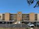 The Yorktown condo building with a well-maintained exterior and covered parking at 7910 Sun Island S Dr # 404, South Pasadena, FL 33707