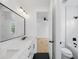 Modern bathroom featuring dual sinks, marble countertops, and a separate toilet and shower area at 816 W Orient St, Tampa, FL 33603
