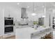 Modern kitchen with stainless steel appliances and marble countertops at 816 W Orient St, Tampa, FL 33603