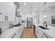 Contemporary kitchen with white cabinets and stainless steel refrigerator at 816 W Orient St, Tampa, FL 33603