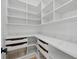 Walk-in pantry features ample shelving, drawers, and countertop space at 816 W Orient St, Tampa, FL 33603