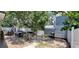 Backyard featuring a patio area, built-in grill, and outdoor seating at 8207 Volusia Pl, Tampa, FL 33637
