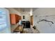 Bright laundry room with modern washer and dryer, sink, and ample storage at 8207 Volusia Pl, Tampa, FL 33637