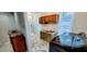 Well-lit laundry room with storage and sink at 8207 Volusia Pl, Tampa, FL 33637