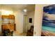 Inviting living area with stylish decor, kitchenette, and comfortable seating, creating a cozy atmosphere at 8207 Volusia Pl, Tampa, FL 33637