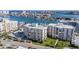 A picturesque view showcasing well-maintained condos, lush landscaping, and waterfront access near Clearwater Beach at 830 S Gulfview Blvd # 102, Clearwater Beach, FL 33767