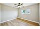 Bedroom features modern flooring and natural light from window at 8417 Bay Pointe Dr, Tampa, FL 33615