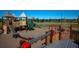 This wooden playground with slides and climbing area is great for neighborhood  at 9487 Raised Tulip Ln, Land O Lakes, FL 34637