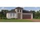 Charming single Gathering home with neutral stucco, dark roof, manicured lawn, and two car garage at 9711 Minnow Ray Dr, Land O Lakes, FL 34638