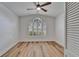 Bright bedroom with window and hardwood floors at 10412 Tara Dr, Riverview, FL 33578